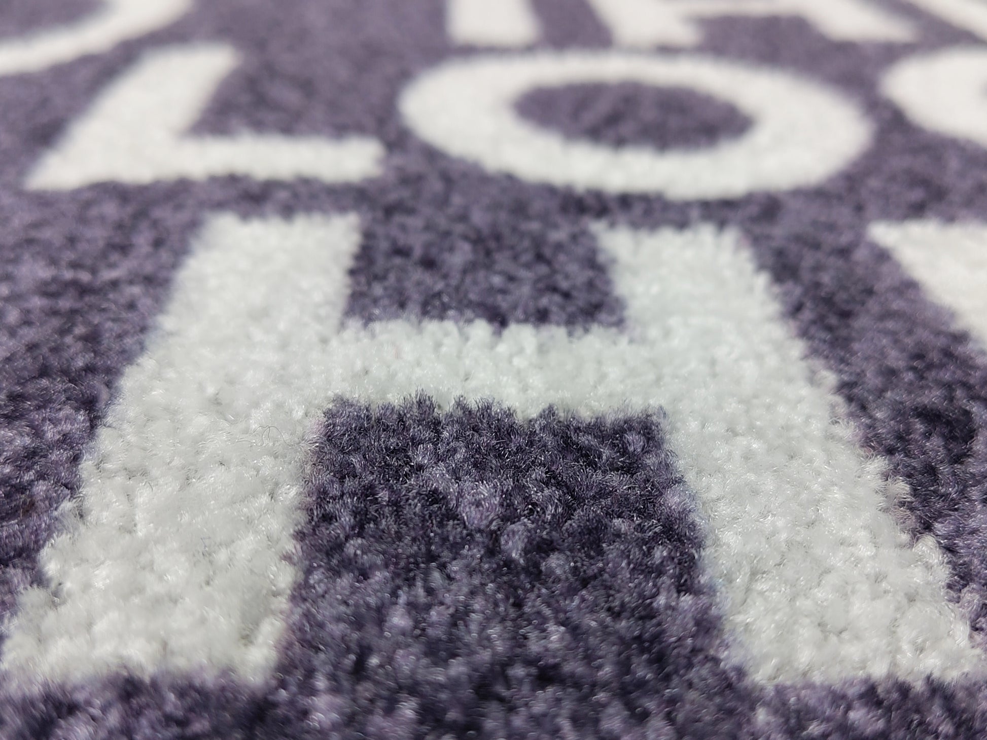 Detailaufnahme des Druckes einer Logomatte