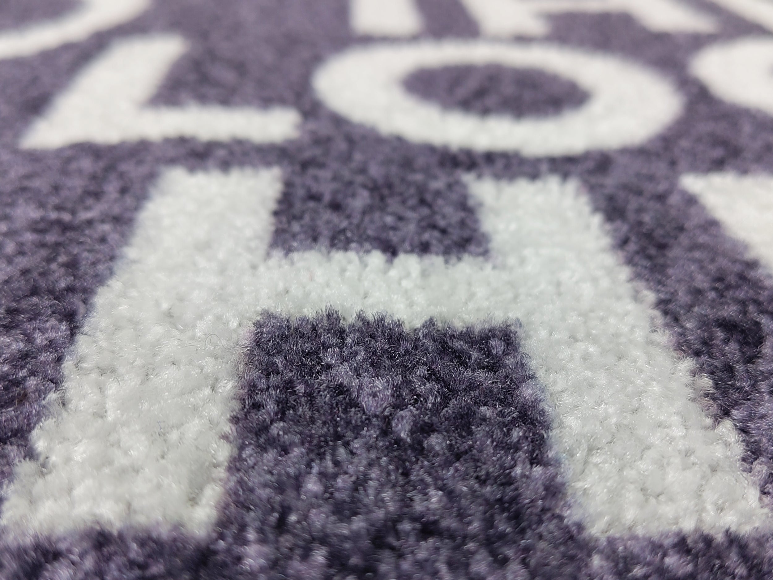 Detailaufnahme des Druckes einer Logomatte