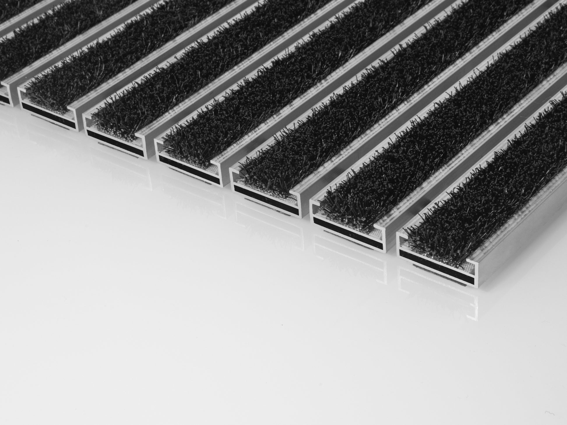 Eingangsmatte in Fliesenhöhe mit Bürsteneinsatz