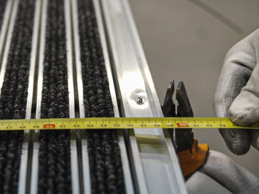 Eingangsmattensystem das nach Maß angefertigt wird