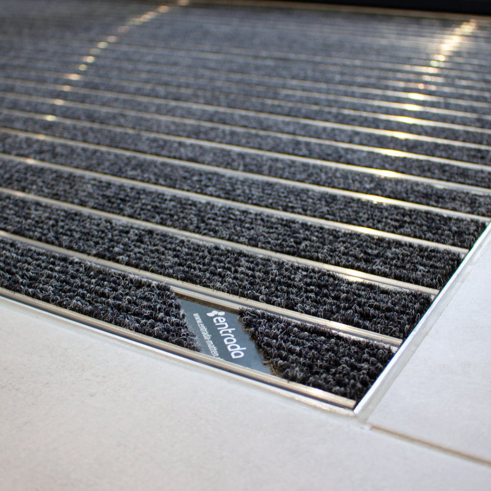 Eingelassene Fußmatte mit entrada Label