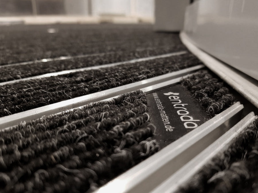 Eingangsmatte in Nahaufnahme mit entrada Logo