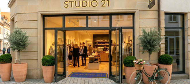 Im Eingang einer Boutique mit dem Namen Studio 21 liegt eine bedruckte Logomatte