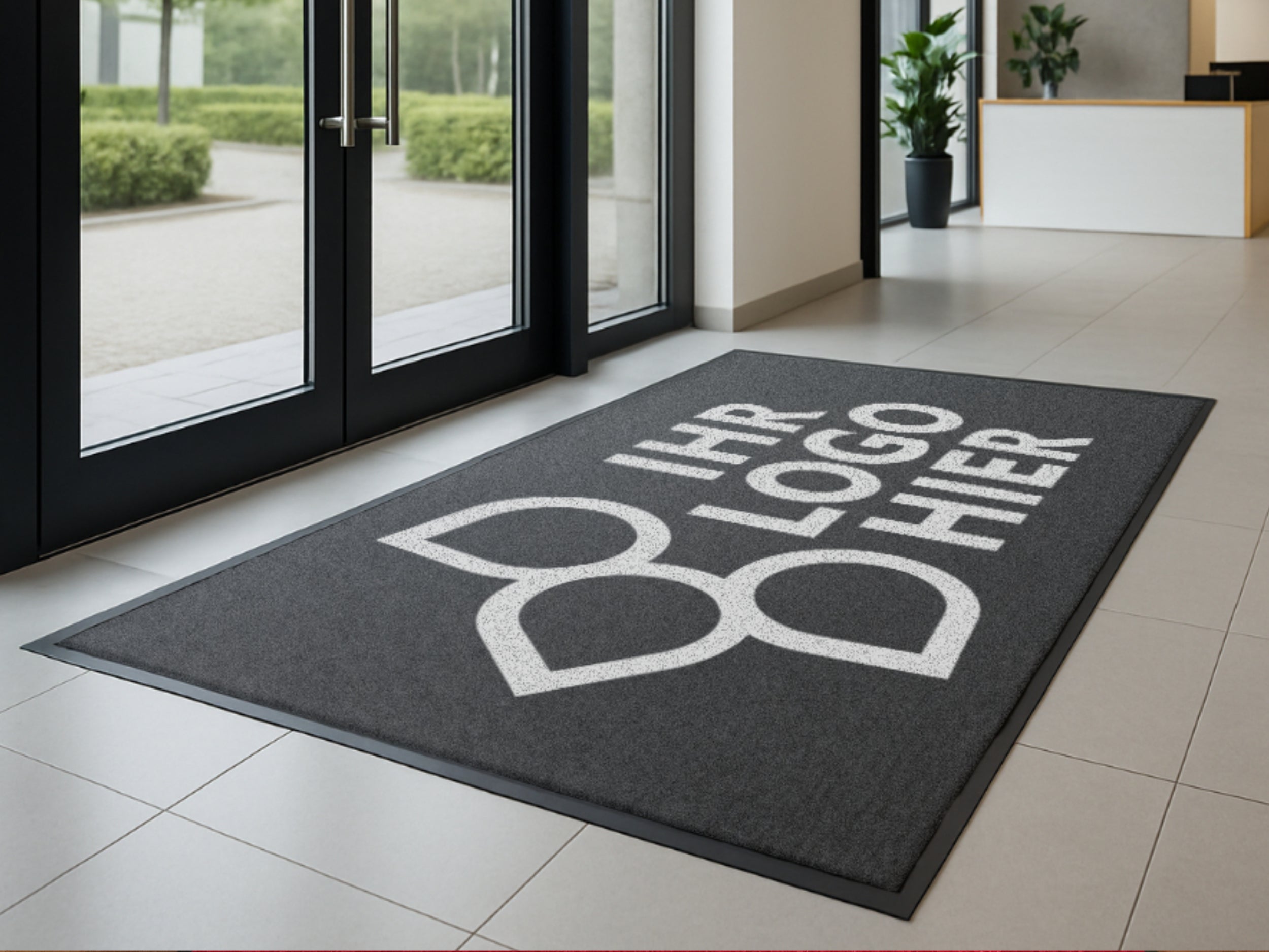 Eingangsmatte bedruckt mit IHR LOGO HIER im EIngangsbereich