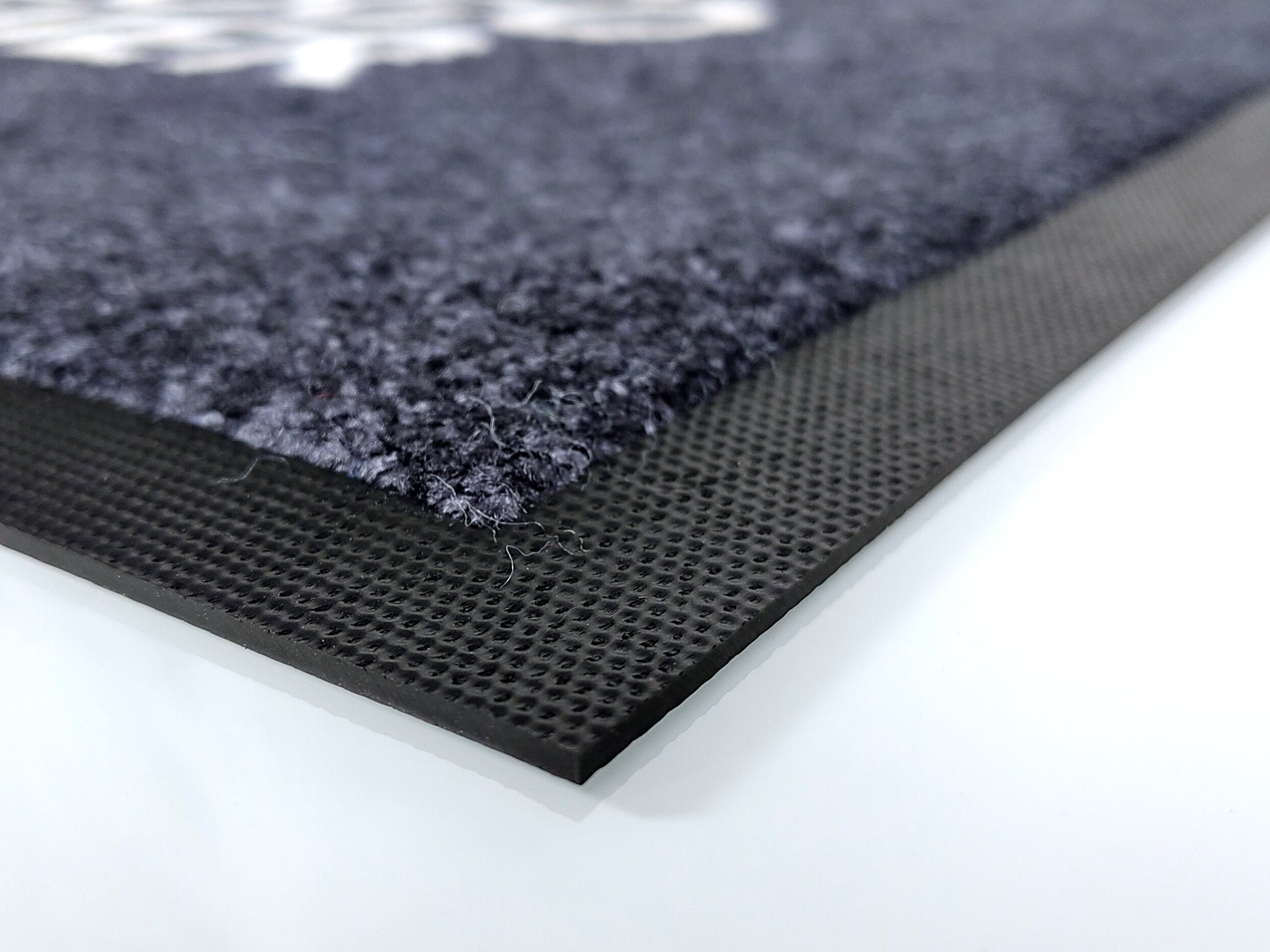 Nahaufnahme des Randes einer Logomatte