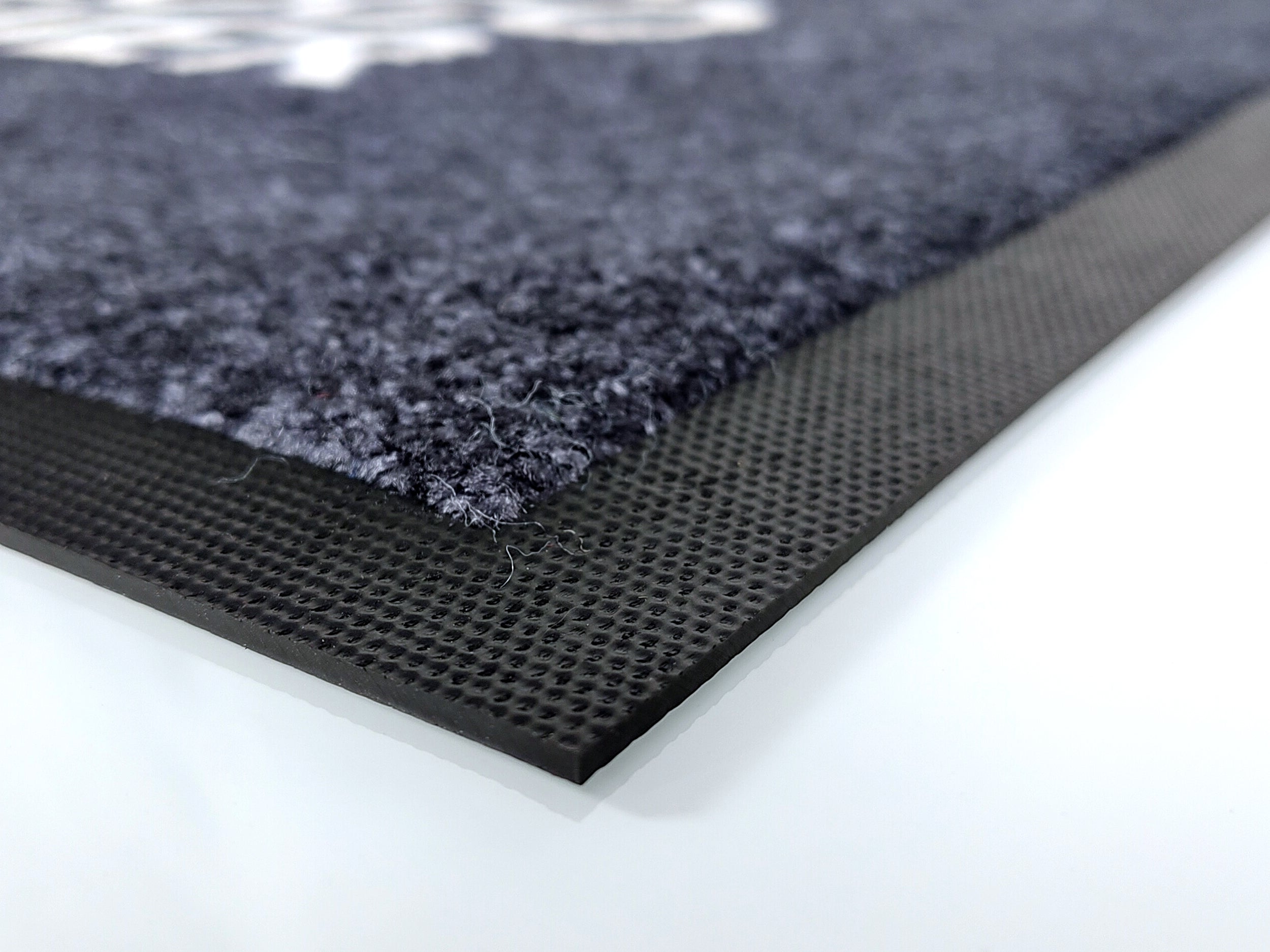 Nahaufnahme des Randes einer Logomatte