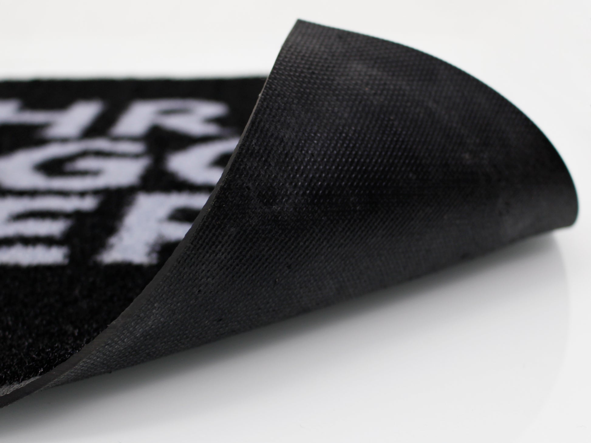 Nahaufnahme der rutschfesten Rückseite einer Logomatte