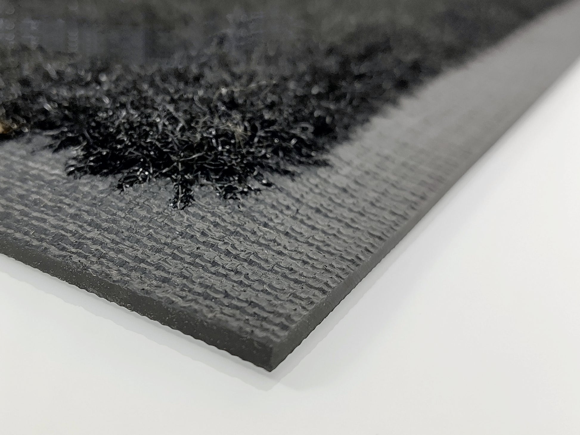 Rand einer Outdoor Logomatte in Schwarz