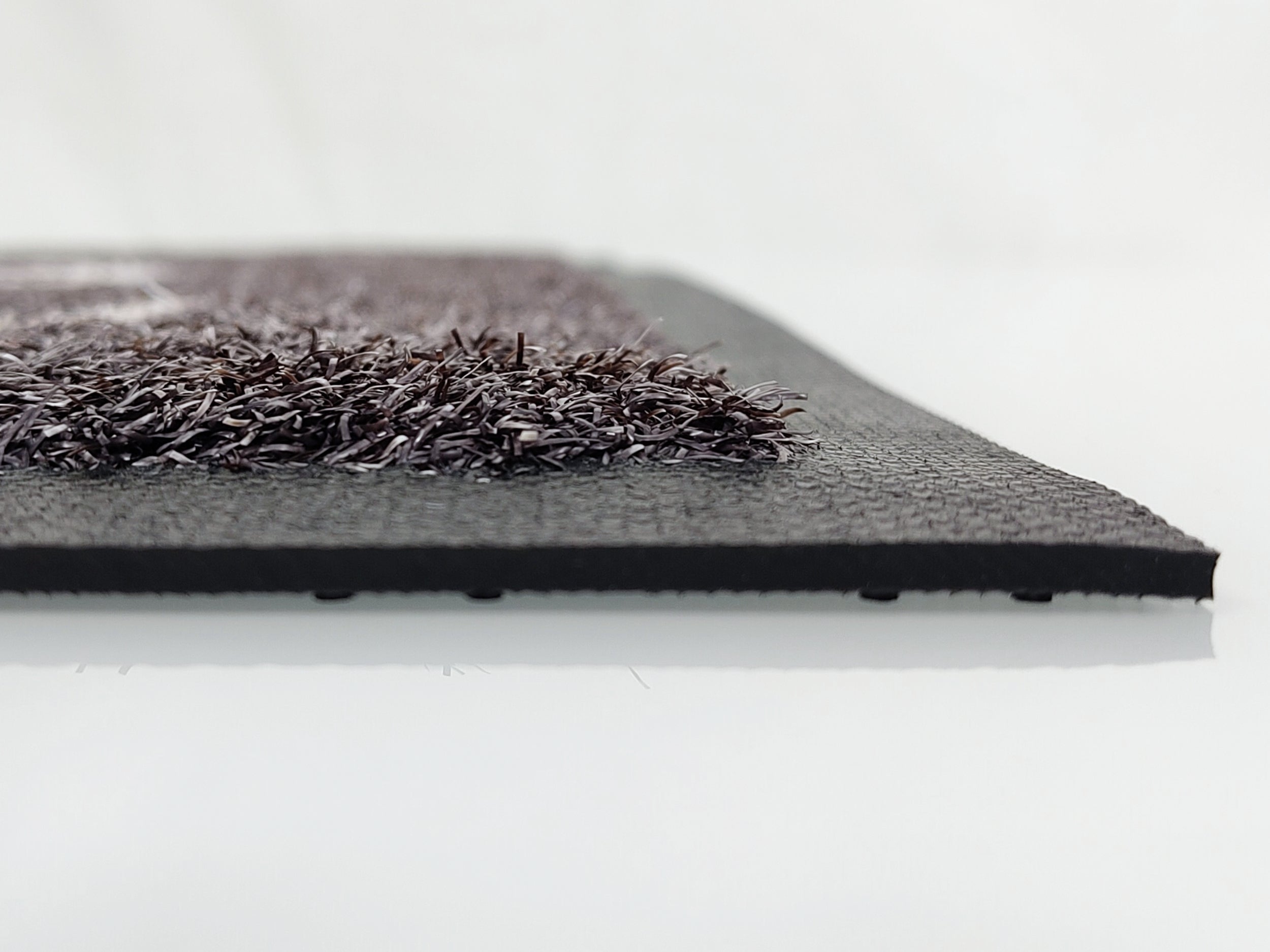 Gummirand einer Matte, aus einem flachen und seitlichem Profil. 