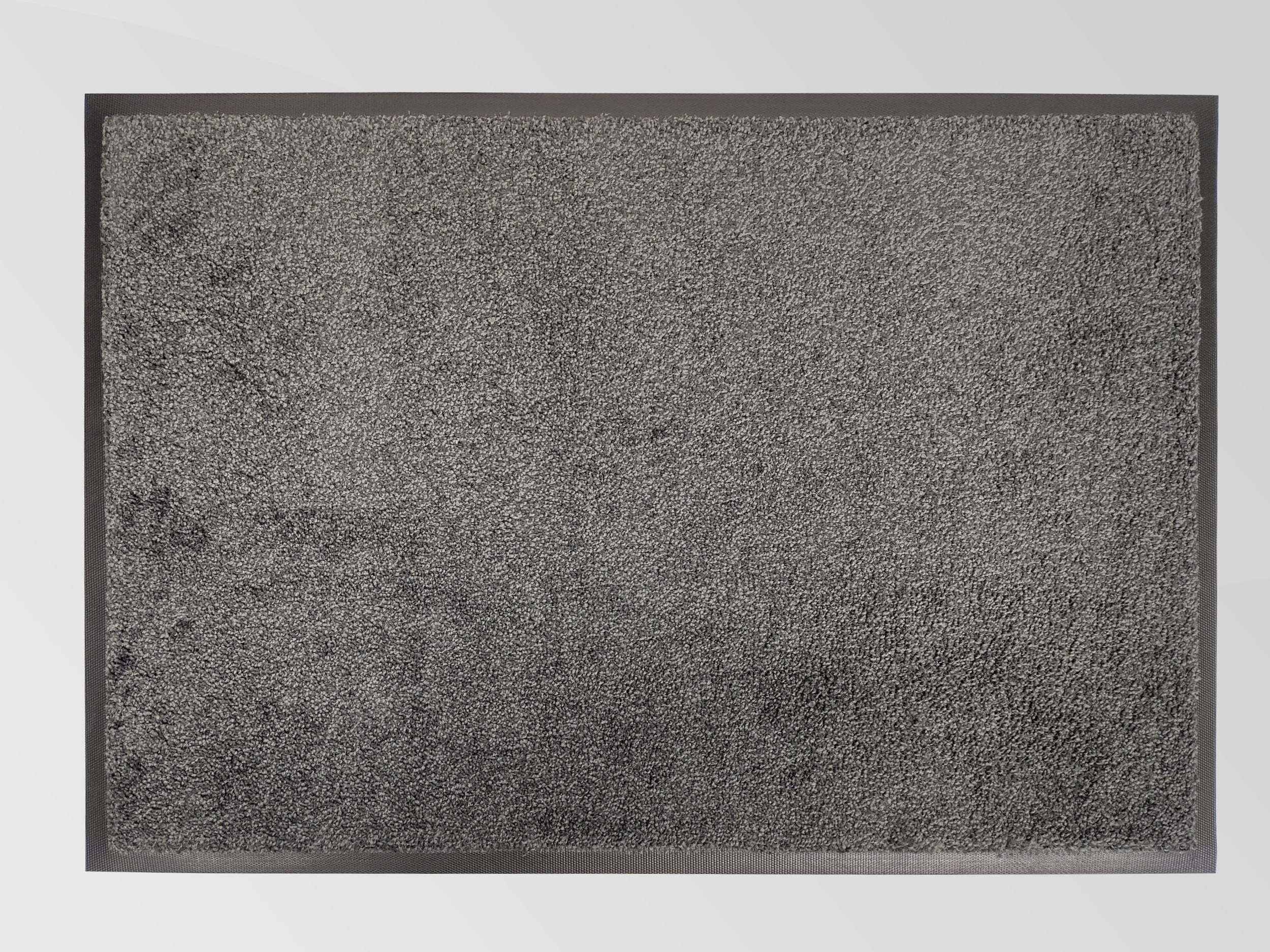 Graue Schmutzfangmatte mit Rand von oben fotografiert