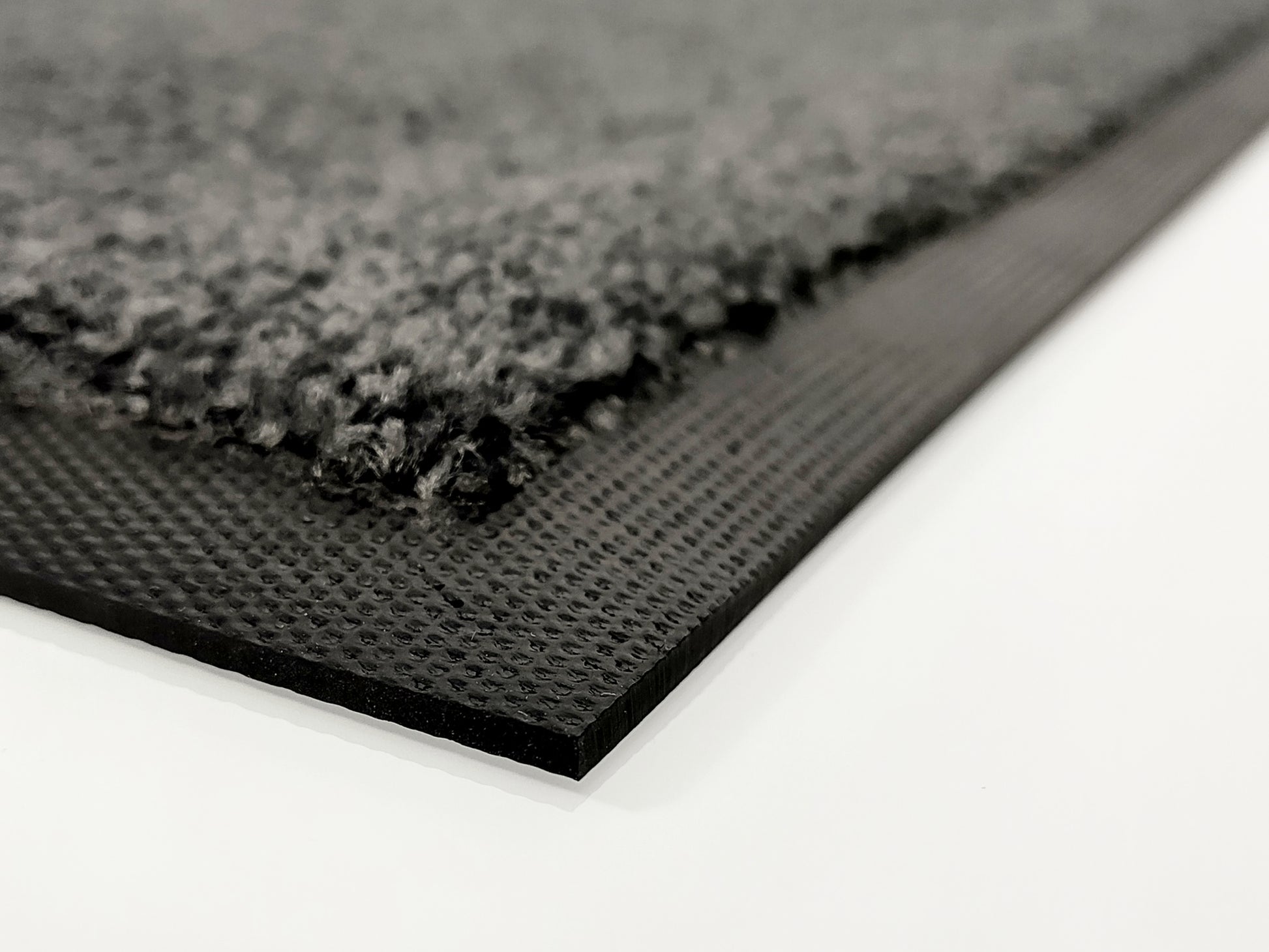 Nahaufnahme: Schwarzer Rand einer Schmutzfangmatte Anthrazit