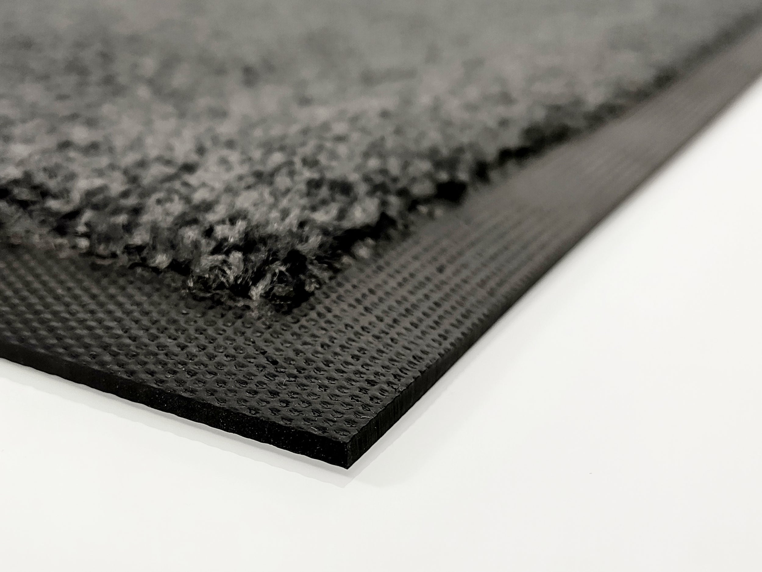 Nahaufnahme: Schwarzer Rand einer Schmutzfangmatte Anthrazit