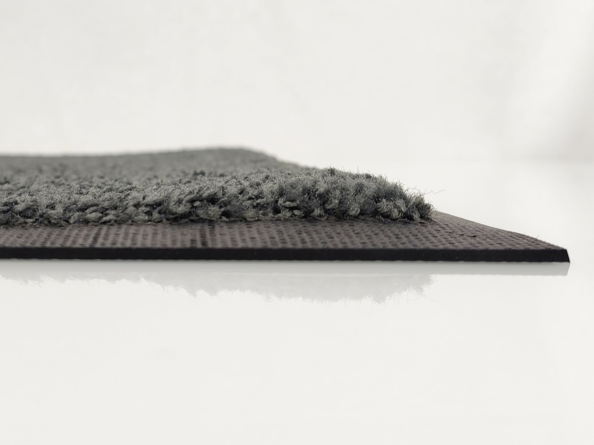 Profilansicht: Grauer Floor einer Schmutzfangmatte mit Rand