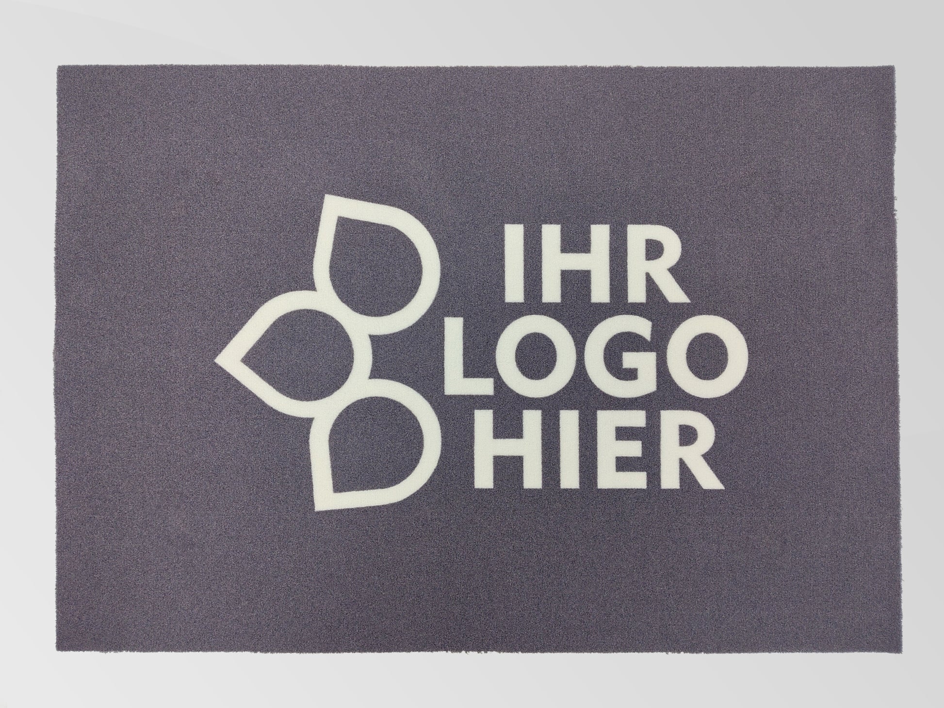 Große Werbematte anthrazit mit weißen Logo und weißen Schriftzug: Ihr Logo hier