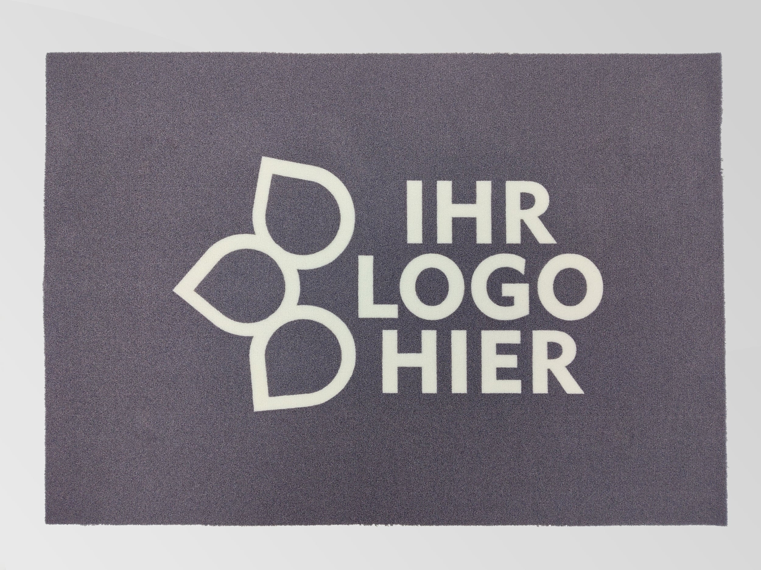 Große Werbematte anthrazit mit weißen Logo und weißen Schriftzug: Ihr Logo hier
