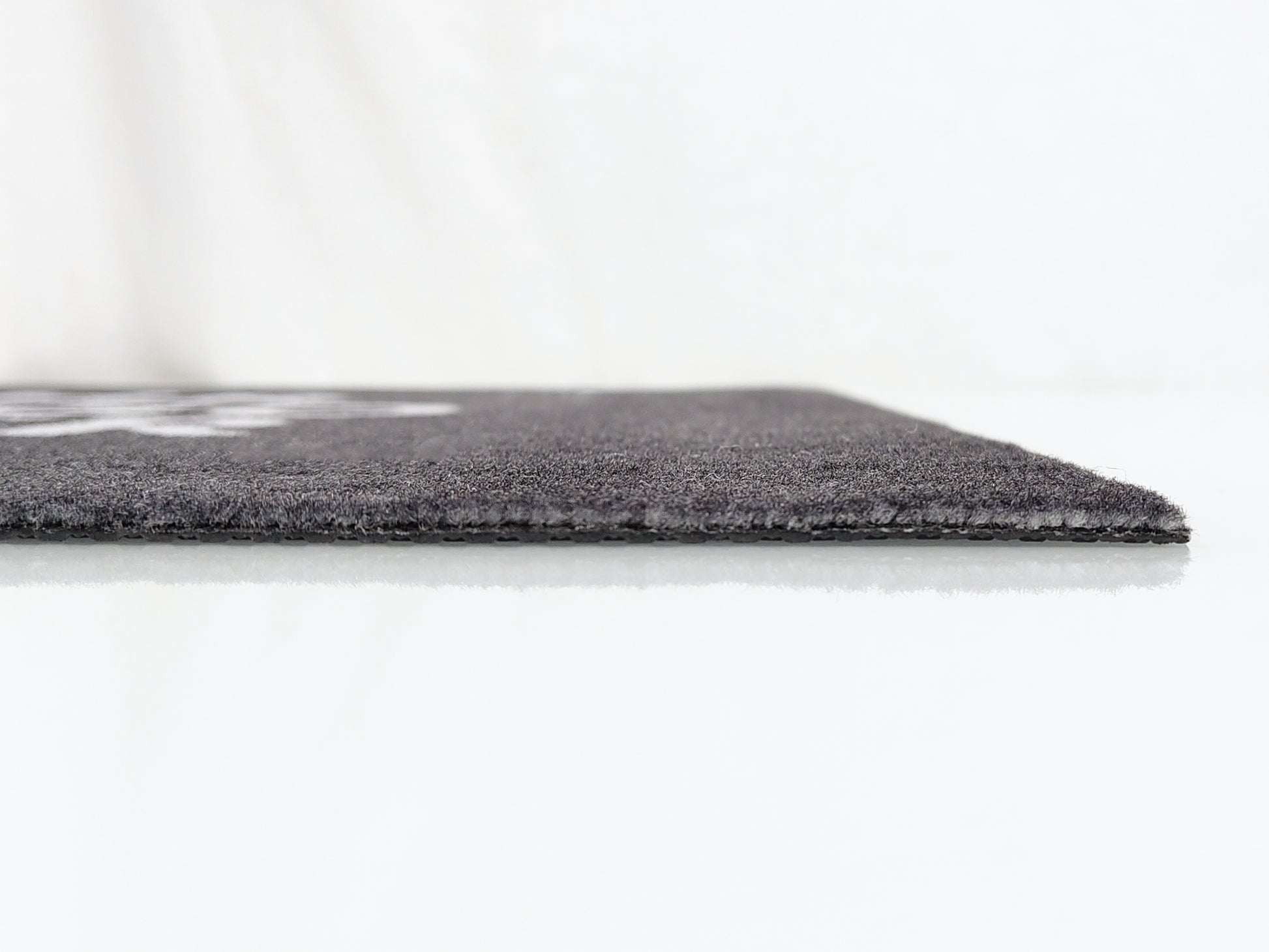 Graue Werbematte ohne Rand aus dem Profil