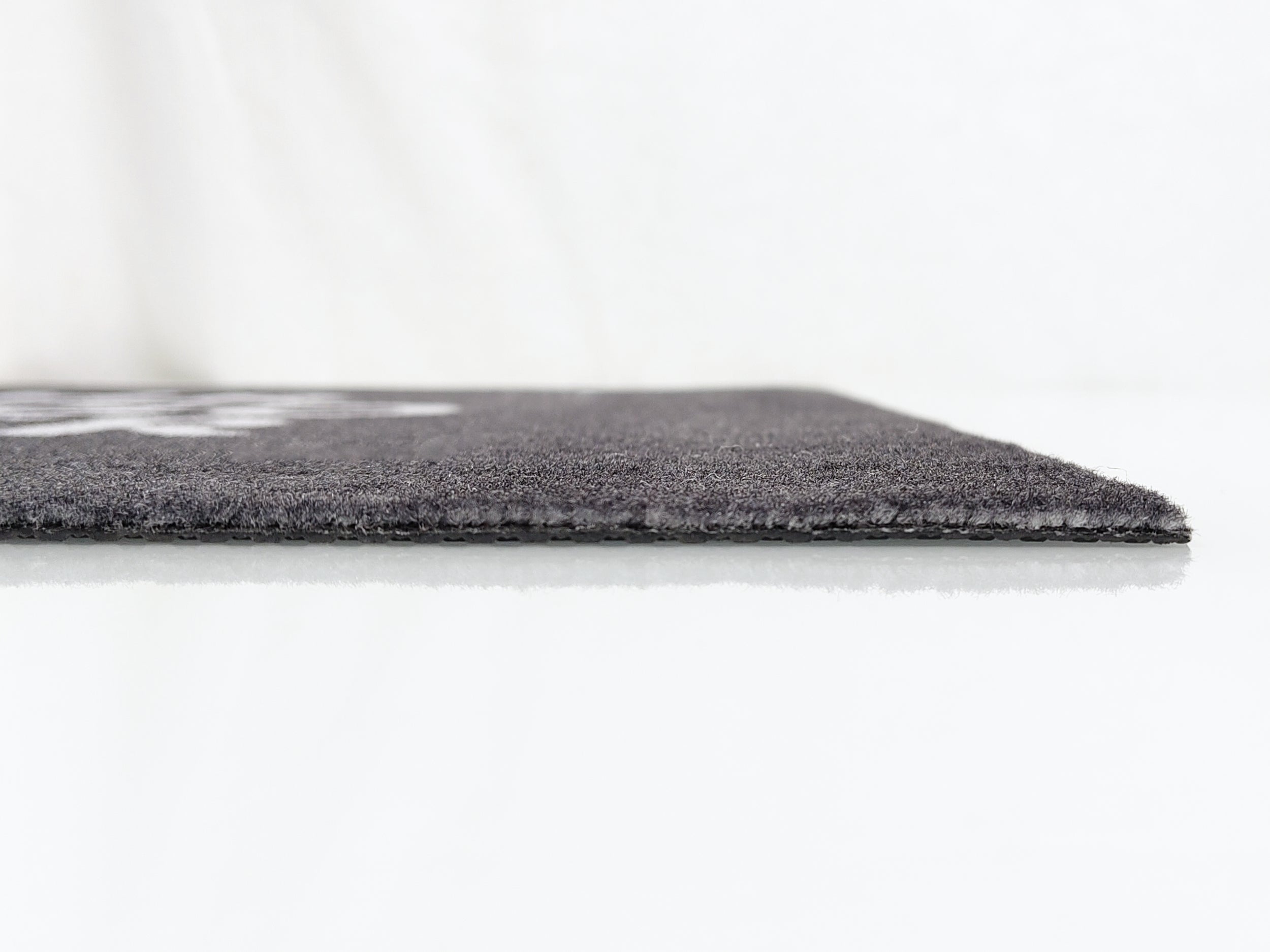 Graue Werbematte ohne Rand aus dem Profil