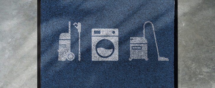 Graue Fußmatte mit Icons Hochdruckreiniger, Waschmaschine und Staubsauger